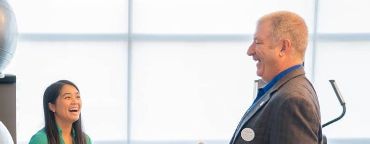 gentleman speaking to female employee