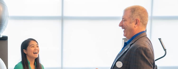 gentleman speaking to female employee